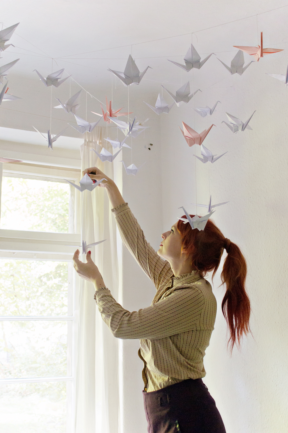 DIY  Renters-Friendly Origami Ceiling Decoration